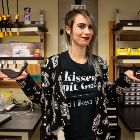 Stella Elwood holding her 3D printed duck splints in the College’s Makerspace