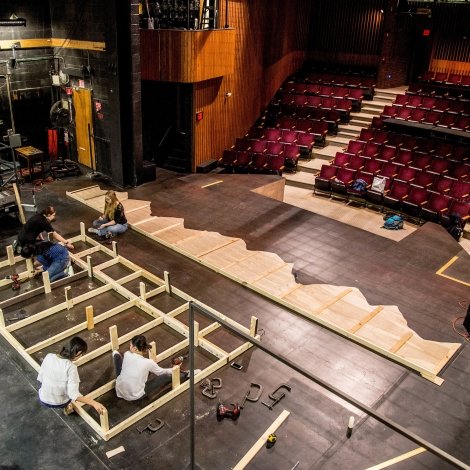 Students building a set in Rooke Theater