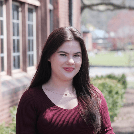 Klara Grygo ’23 standing outside on the Mount Holyoke College campus