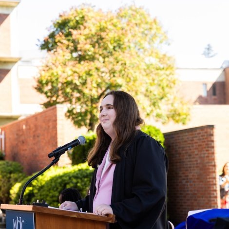Lily E. Rood ’27 speaking at Convocation in fall 2024. 