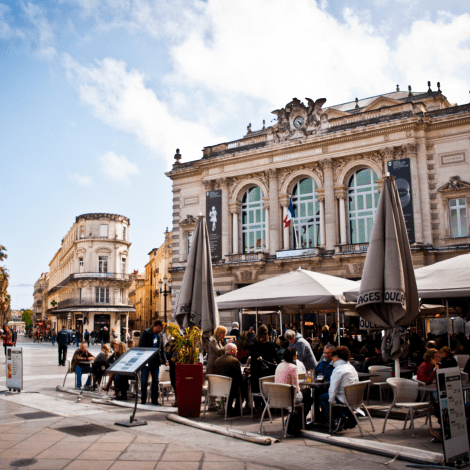 Downtown Montpellier, France with people seated at an open air cafe