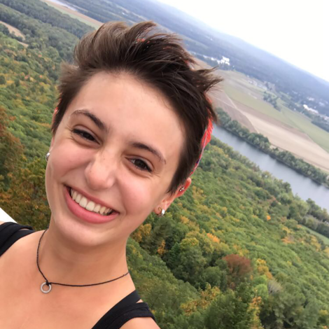  Isabel DiBiasio-Hudson atop Mount Holyoke on Mountain Day