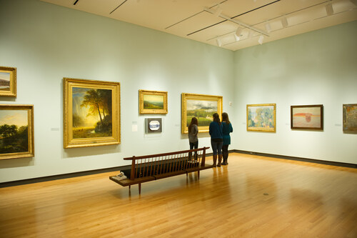 Students studying a painting in the Mount Holyoke College Art Museum