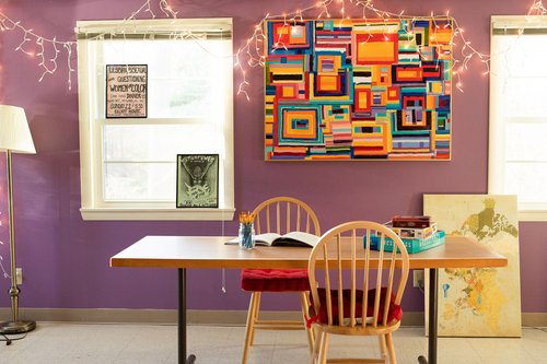 A working table in the living room of the Jeannette Marks Cultural Center
