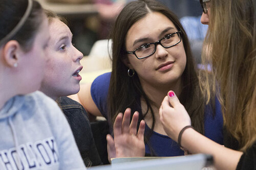 Students having an animated conversation