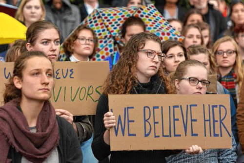 Students standing in solidarity during the MeToo movement