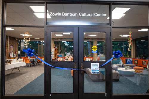The doors to the Zowie Banteah Cultural Center, adorned with a blue ribbon to mark the grand opening of the new location