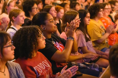Students clapping during the Honor Code Ceremony at Mount Holyoke College