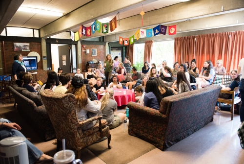 Students gathering in the lounge of Eliot House