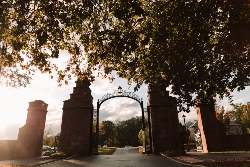 The Gates to MHC at sunset.