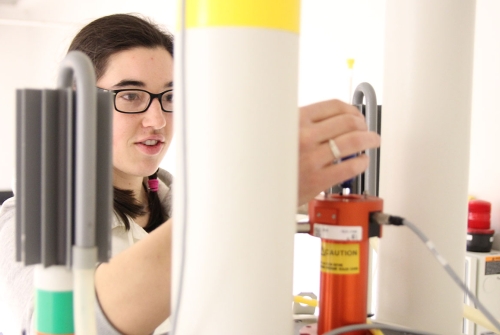 A student using Nuclear Magnetic Resonance (NMR) 