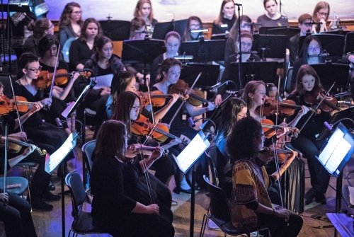 Students performing with the Mount Holyoke Symphony Orchestra