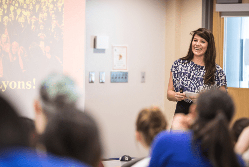 A student presenting during Senior Sympoisum