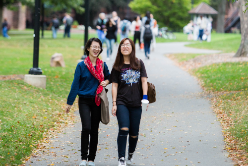 Students walking on campus walkways