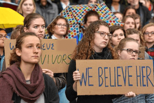 Students standing in solidarity during the MeToo movement