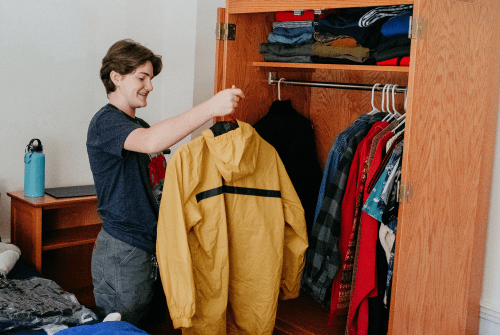 A student unpacking on move-in day
