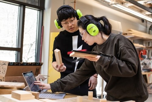 Students working on a wood project in the Fimbel Lab