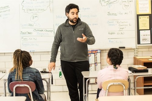 Teaching two students in a classroom