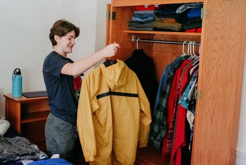 A student unpacking on move-in day