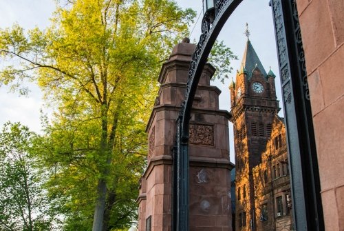 Image of the Gates, clock tower in the background.