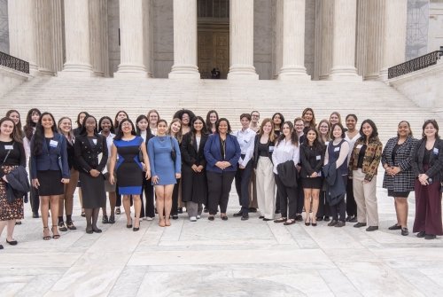 Mount Holyoke students pose with President Holley outside Supreme Court, Washington D.C.