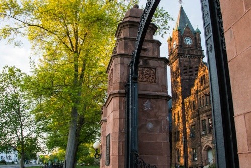 Image of the Gates, clock tower in the background.