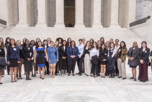 Mount Holyoke students pose with President Holley outside Supreme Court, Washington D.C.