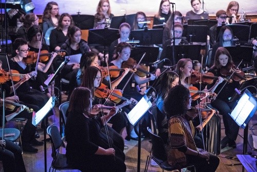 Students performing with the Mount Holyoke Symphony Orchestra