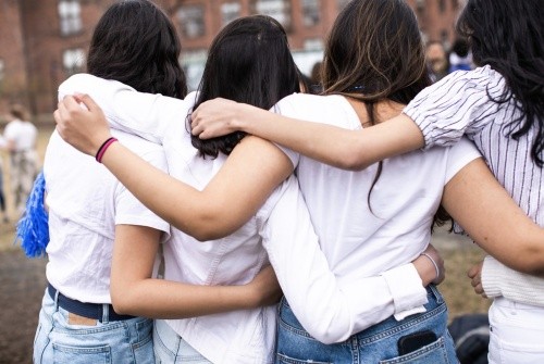 Students outside embracing at Mount Holyoke College