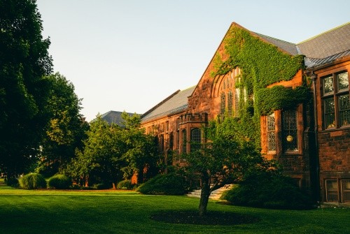Ivy climbs the walls of a brick building on the Mount Holyoke College campus.