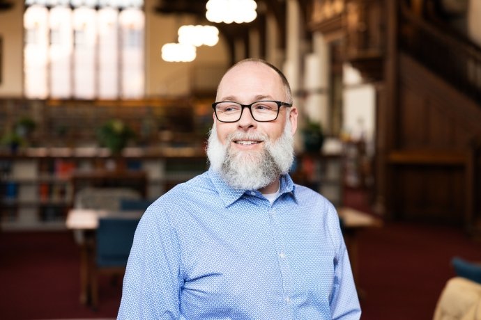 Mike McKenna in the Mount Holyoke College library in 2024.