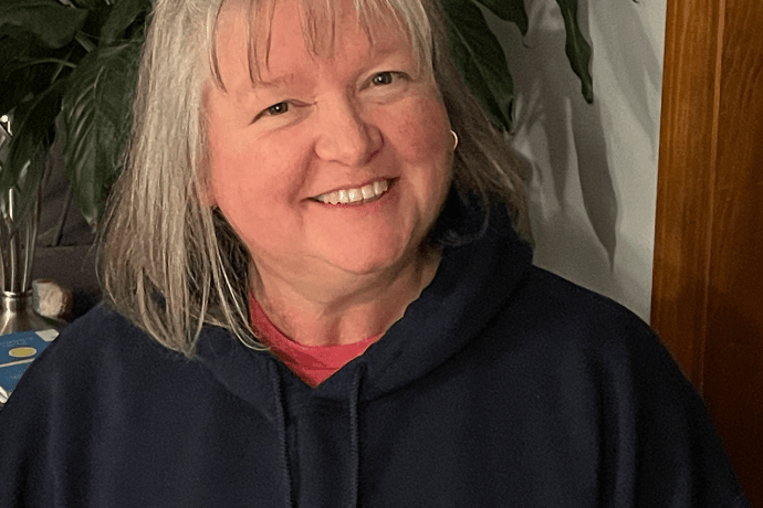 Cheryl Flynn wearing a Mount Holyoke College sweatshirt