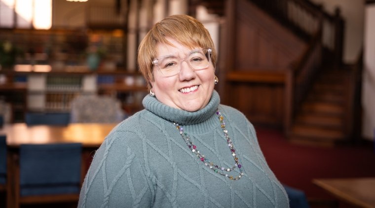 Michelle St. James, in the library in 2024