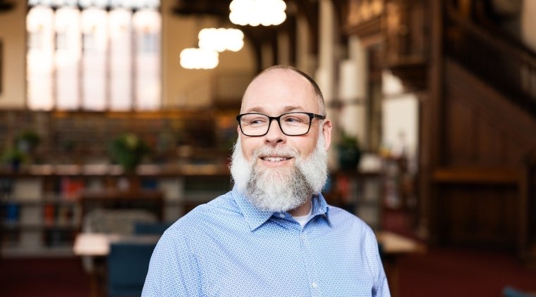 Mike McKenna in the Mount Holyoke College library in 2024.