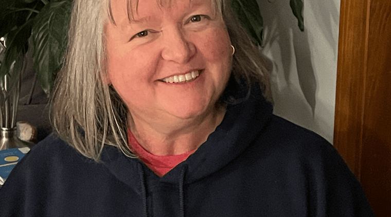 Cheryl Flynn wearing a Mount Holyoke College sweatshirt