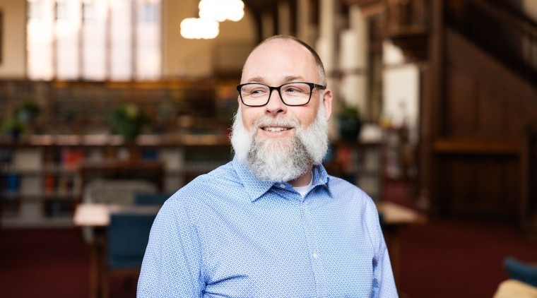 Mike McKenna in the Mount Holyoke College library in 2024.