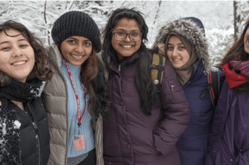 Group of students smiling in winter