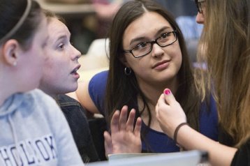 Students having an animated conversation
