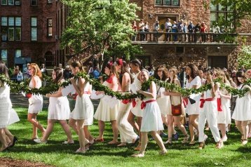 Mount Holyoke seniors carry a laurel chain in an annual parade.