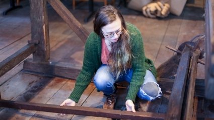 Erin Hancock placing a loom part