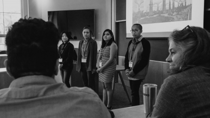 Four student presenters listening to a question at LEAP 2018
