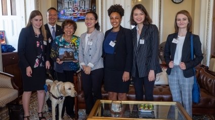 Rep. Nita Lowey '59 and students