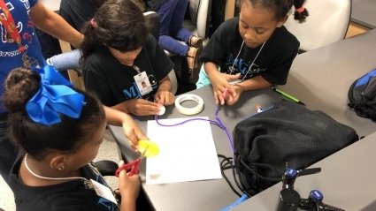 STEM Camp - students learning how to protect eggs during egg drops