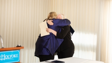 Sonya Stephens and KC Haydon embrace at the Faculty Awards in 2020