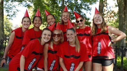 Sophomores in scarlet crayon-inspired outfits smile to celebrate the beginning of the new academic year.