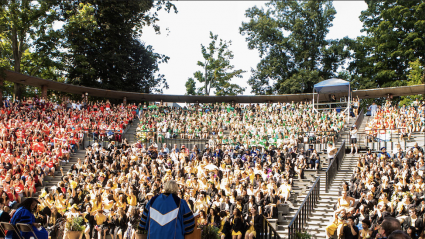 Convocation 2018: President Sonya Stephens addresses a sea of students in their class colors at the Gettell Amphitheater