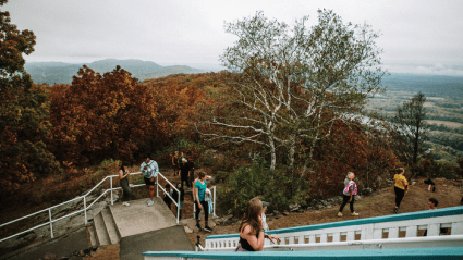 Students enjoying the view from the Summit House atop Mount Holyoke.