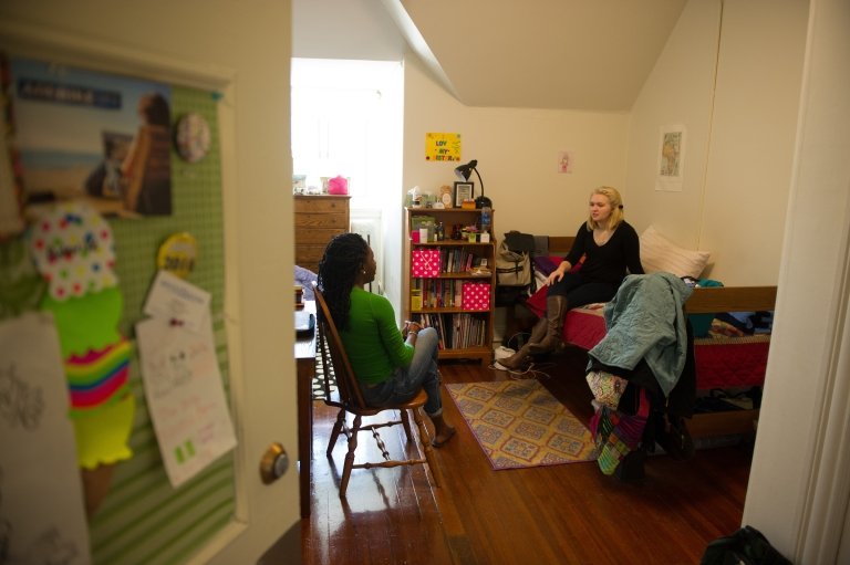 A residence hall room as soon through an open door