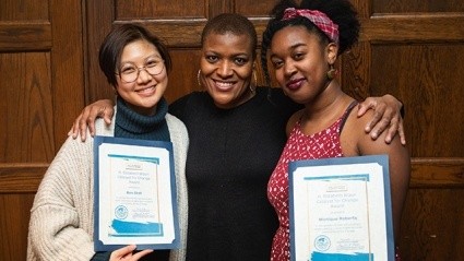Recipients of the H. Elizabeth Braun Catalyst for Change Award, Ren N. Dinh ’19 (left) and Monique A. Roberts ’19 (right), pose with Latrina Denson, associate dean of students for community and inclusion.