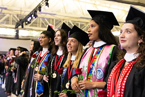 Students watch the stage during Commencement 2026